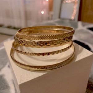 4 gold bangles